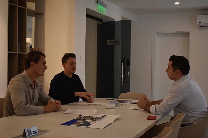 Advisors discussing a land investment in Paraguay
